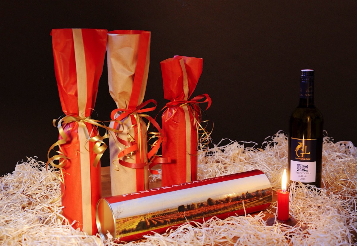 Einzelverpackung – Wein in Papprolle und Geschenkpapier